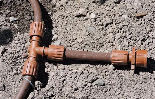 Photo of irrigation tubing with flush valve. Photo by Leslie Hart.