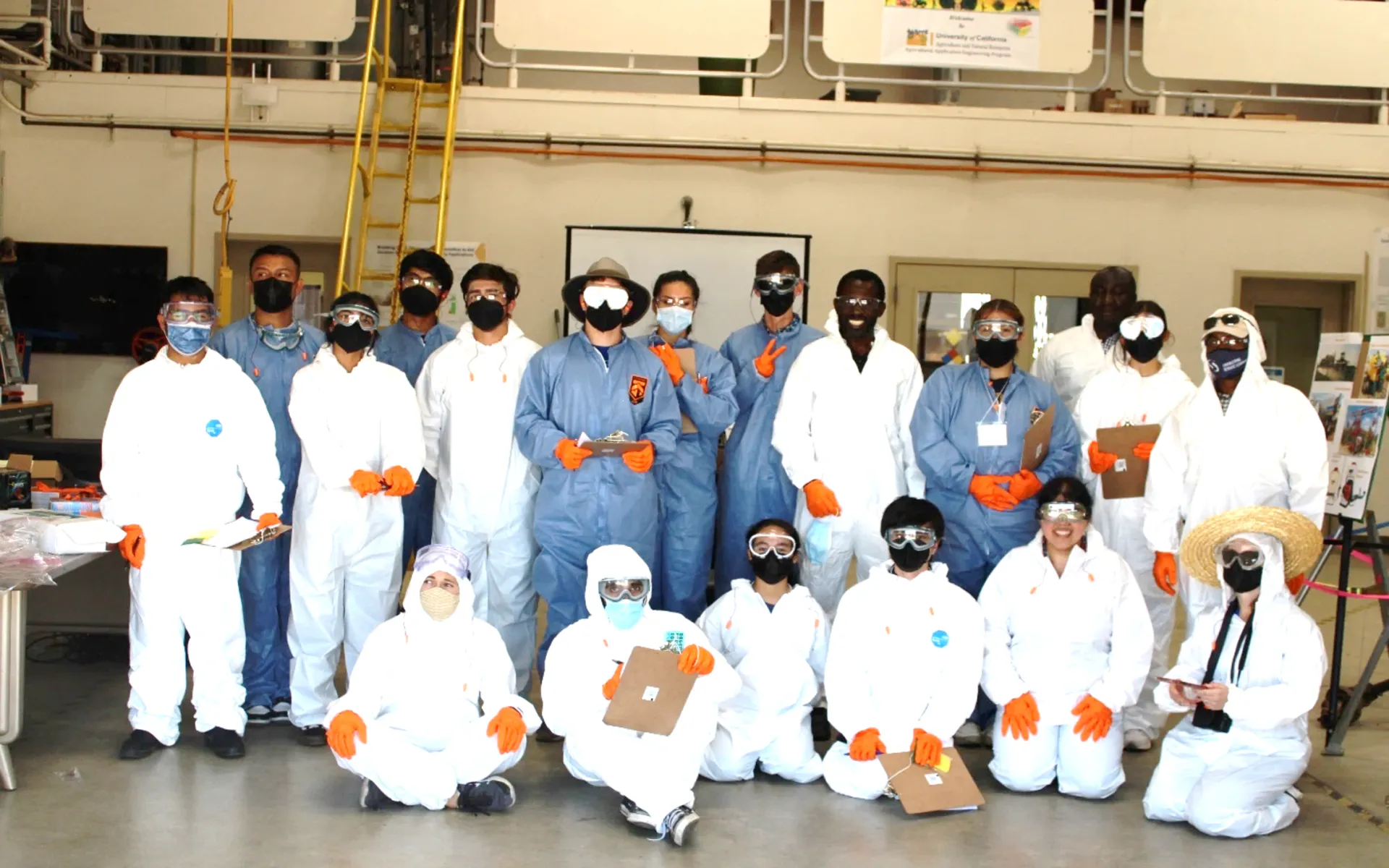 Group of people wearing personal protective clothing