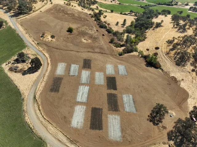 Aerial view of experimental plots at Sierra Foothill REC, with whitish-gray rectangles indicating the addition to rock dust