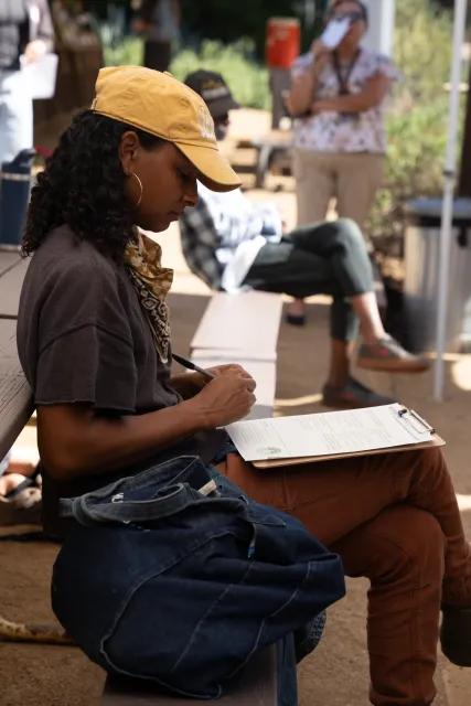 Jessica Handy takes notes during an agritourism workshop