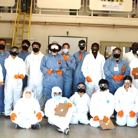 Group of people wearing personal protective clothing