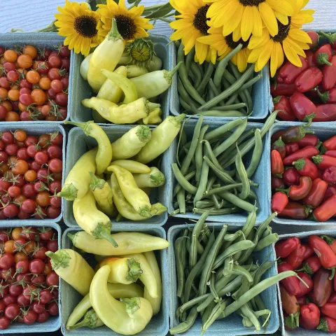 assorted vegetables in produce baskets