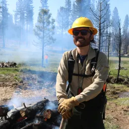 Kane Russell at a pile burn