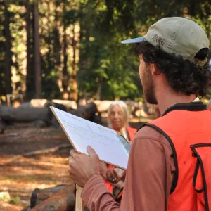 Man holding a clipboard.